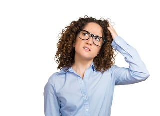 Closeup portrait young woman with glasses scratching head, thinking daydreaming deeply about something, looking up, isolated white background. Human facial expression emotions, feelings, body language.jpeg