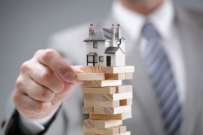 b2b-marketing-team-structure-house-atop-jenga